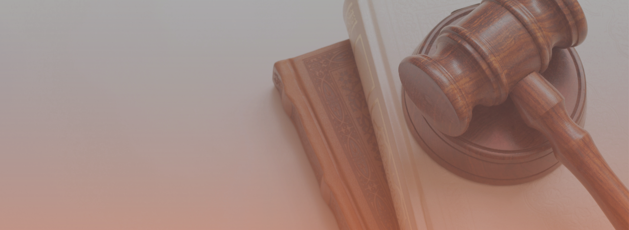 image of gavel on top of books