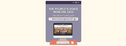 Computer monitor displaying a government website homepage with a banner and navigation menu on a blue background.