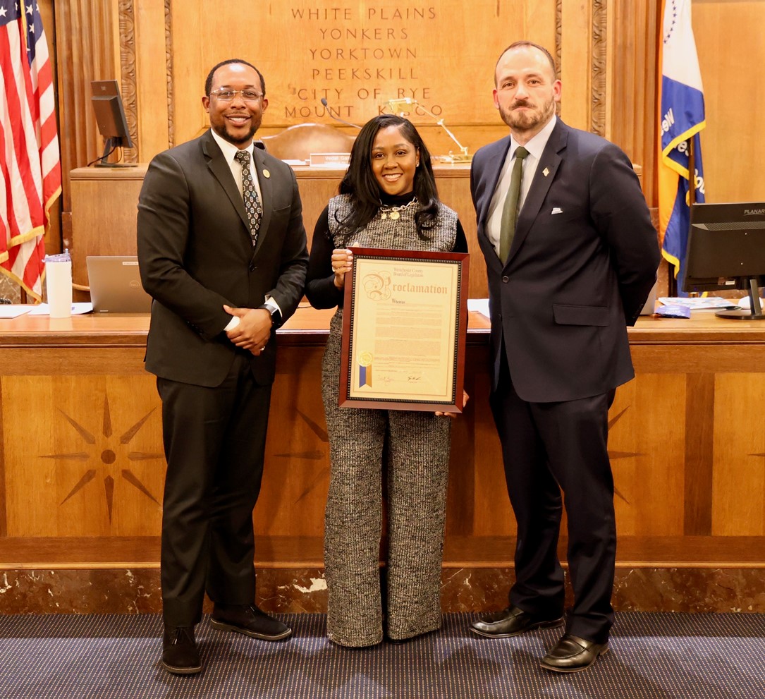 Legislators pose with honoree